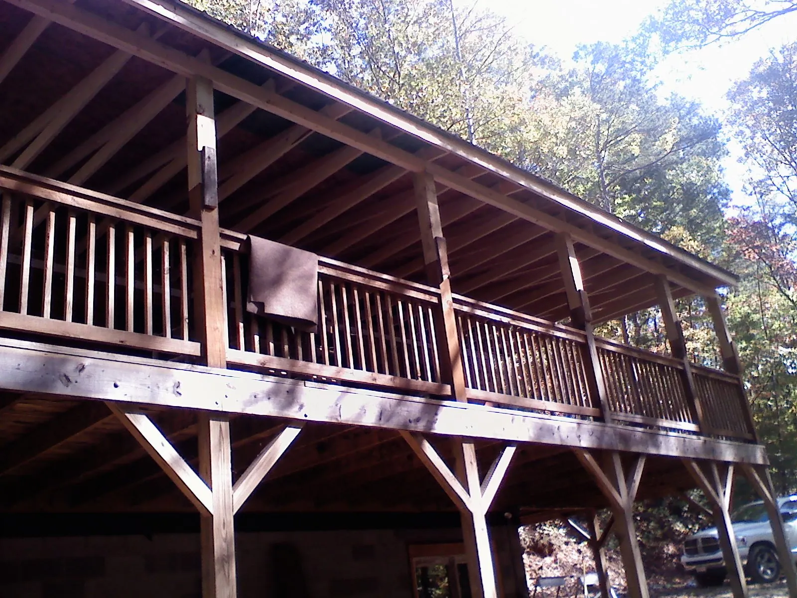 Timber framing under a new elevated porch and deck — Roof Leak Repair in South Woodstock by Roofing Brothers